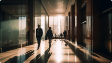 office building hallway with silhouetted figures