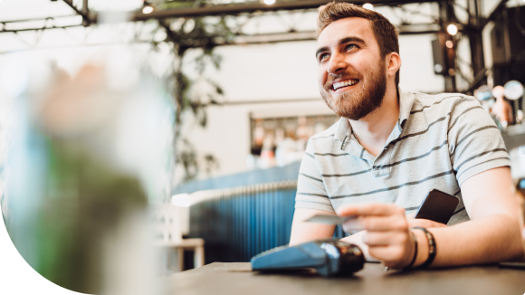 man holding credit card