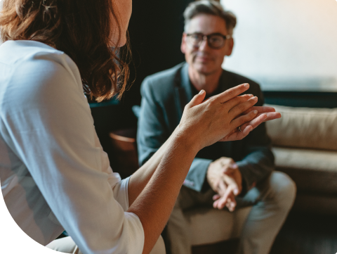 two people in conversation